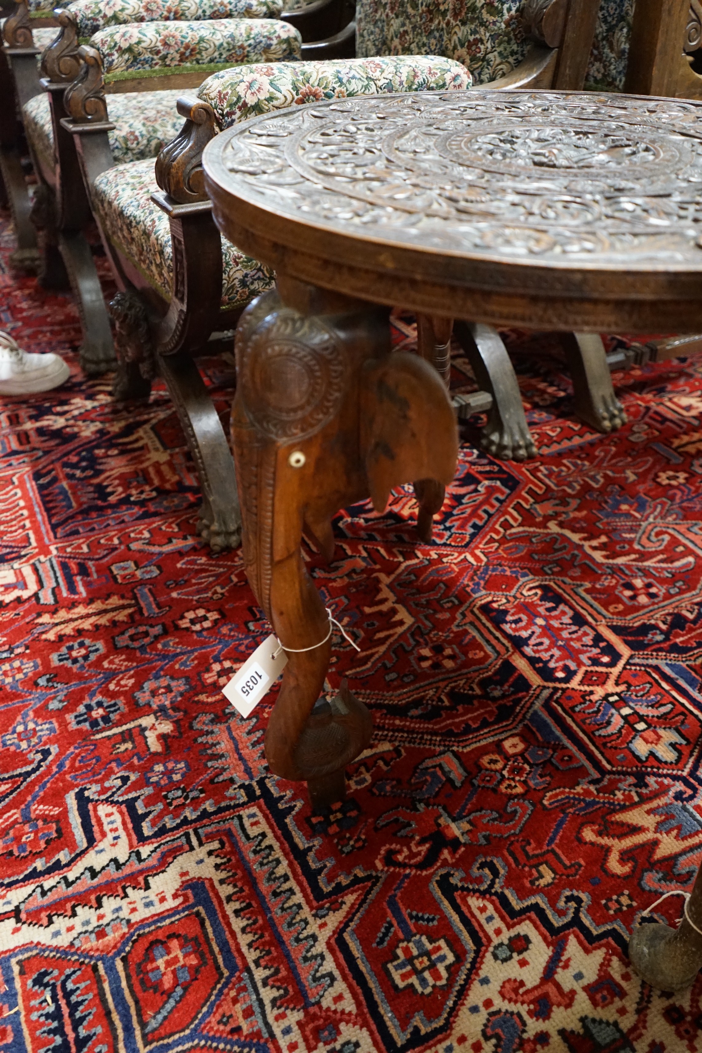 An Indian circular carved hardwood occasional table, diameter 60cm, height 63cm